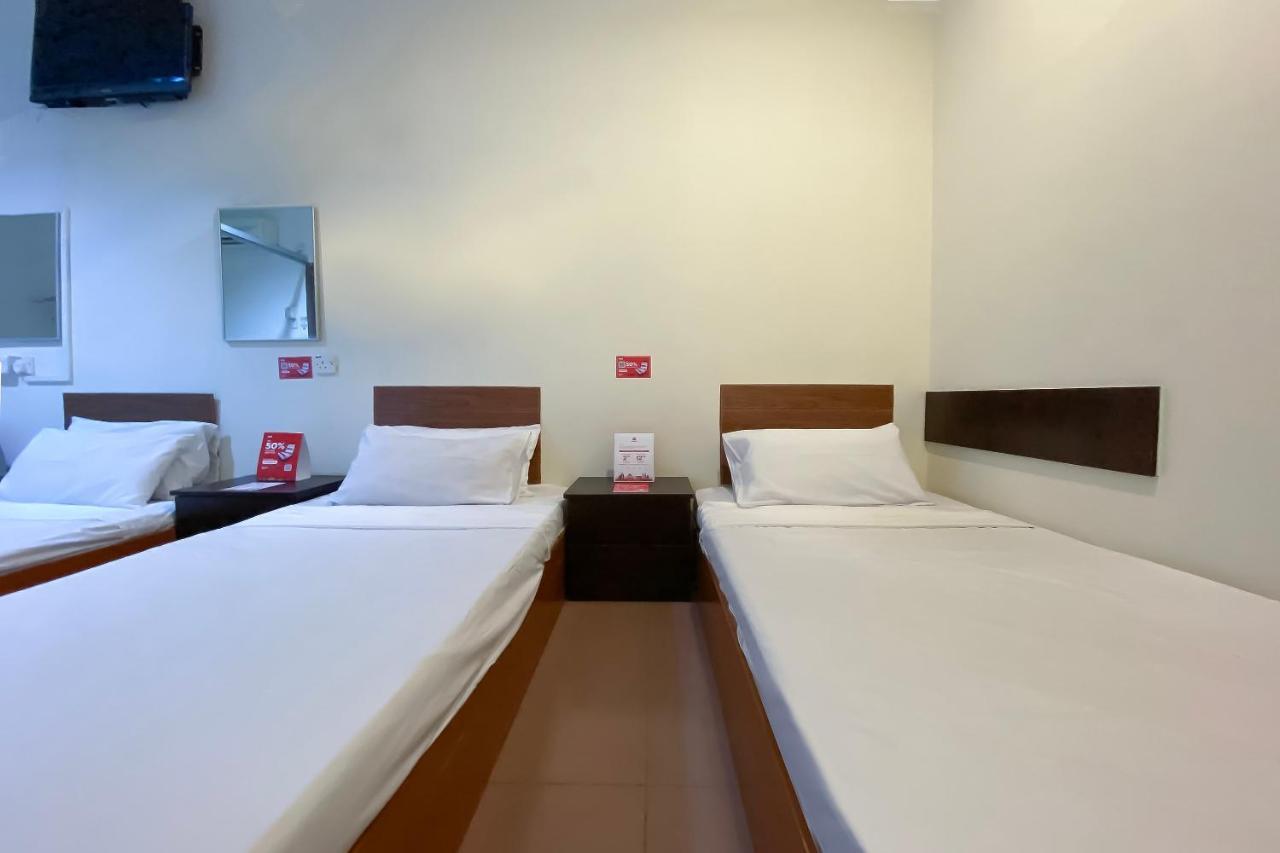 Spot On 89907 Motel Impian Сери-Манджунг Экстерьер фото