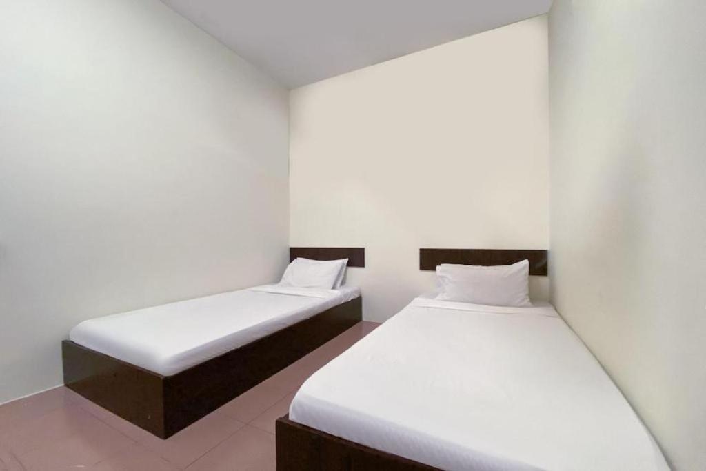 Spot On 89907 Motel Impian Сери-Манджунг Экстерьер фото